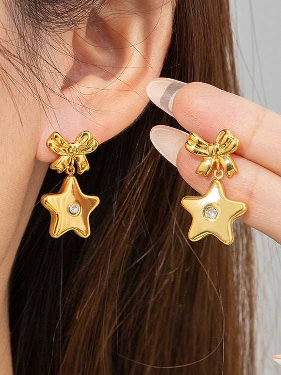 Aretes Estrellas Con Moños