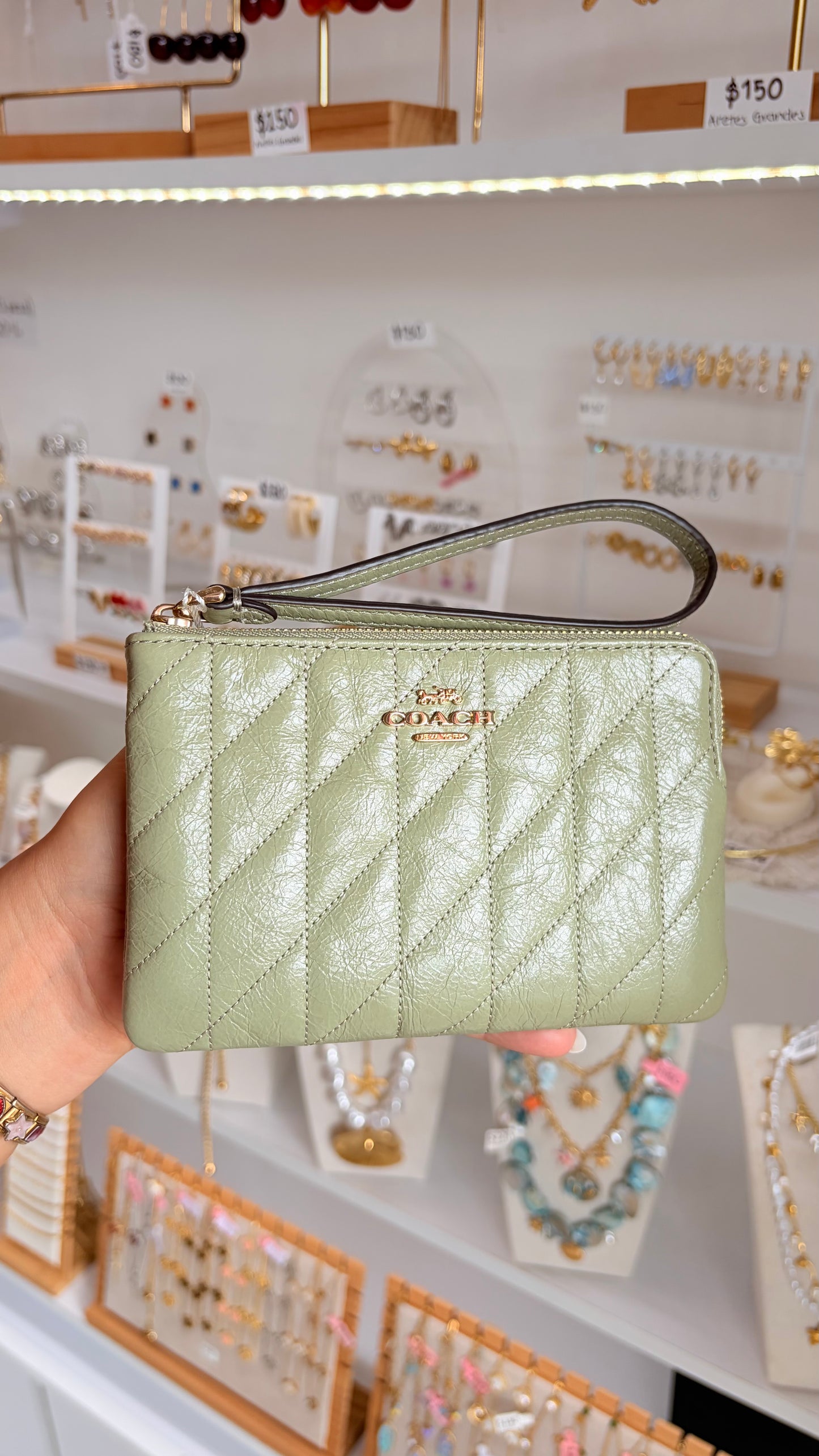 Muñequera Dama Chica Verde Coach