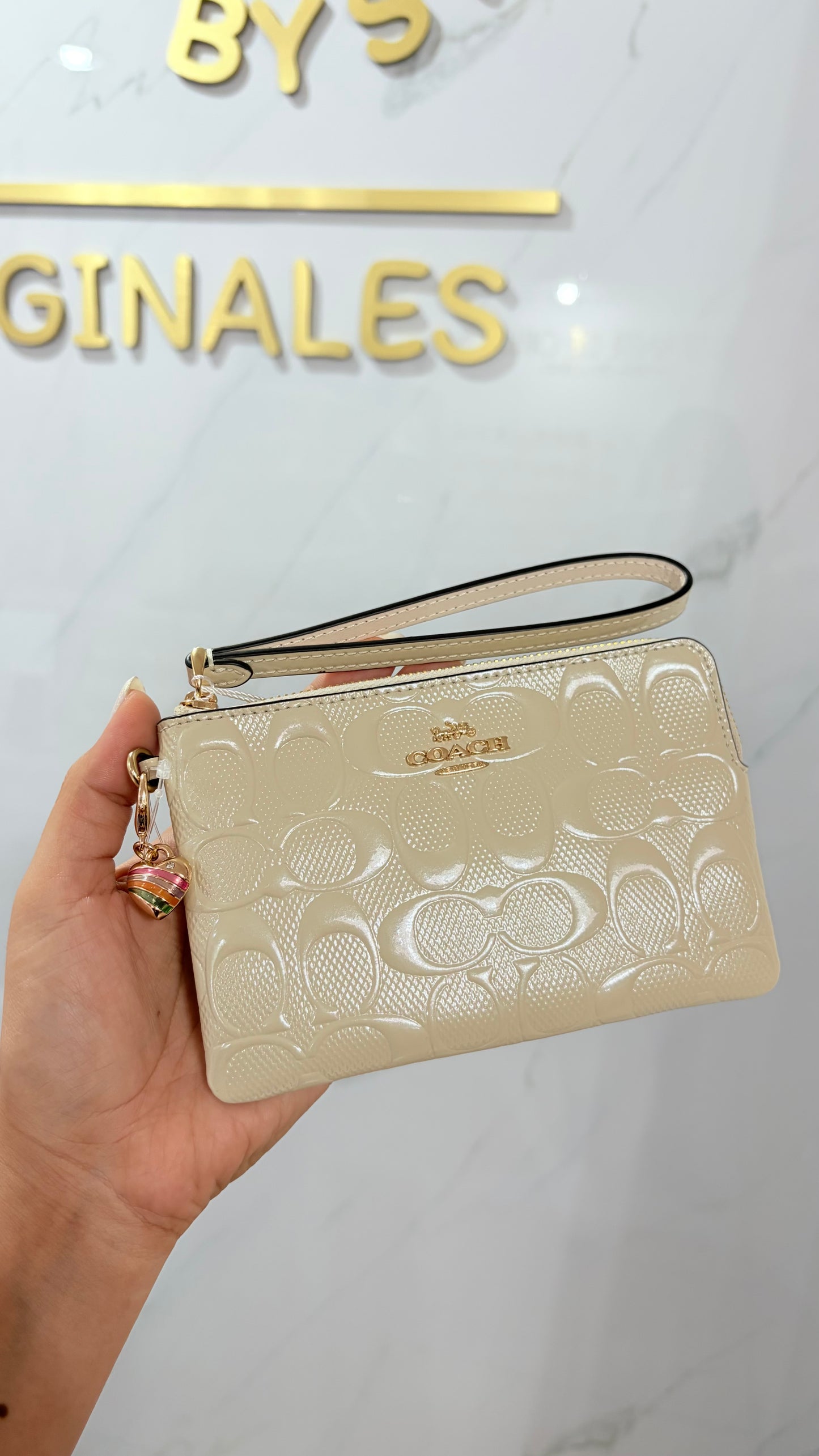 Muñequera Dama Chica Blanca Coach
