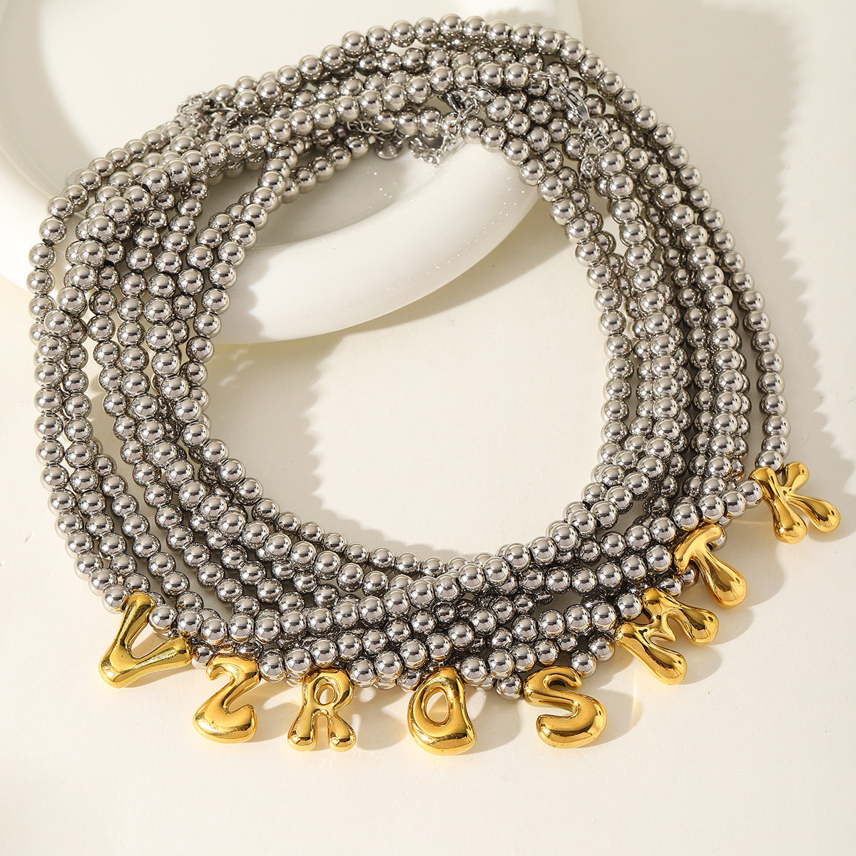 Collar Borlas Plateadas Con Inicial Dorada S