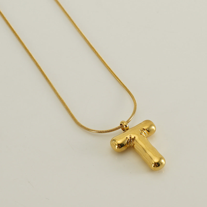 Collar Inicial Grande Dorado Acero