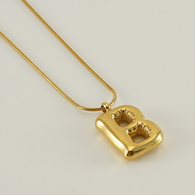 Collar Inicial Grande Dorado Acero