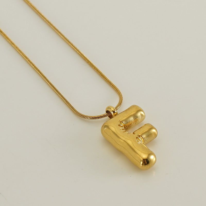 Collar Inicial Grande Dorado Acero
