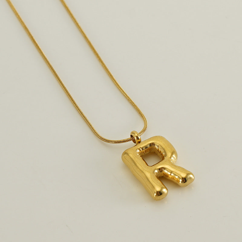 Collar Inicial Grande Dorado Acero