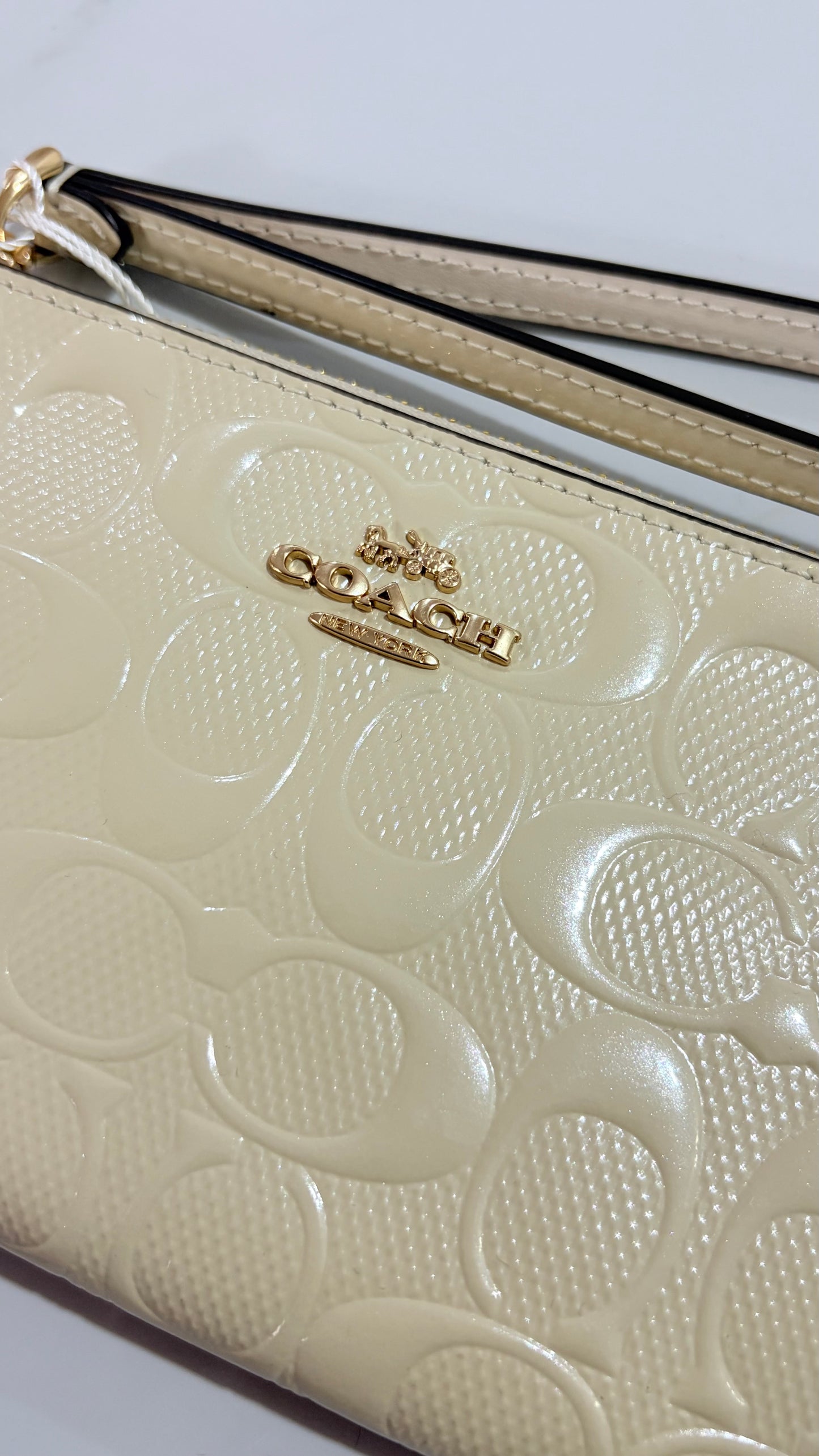 Muñequera Dama Chica Blanca Coach