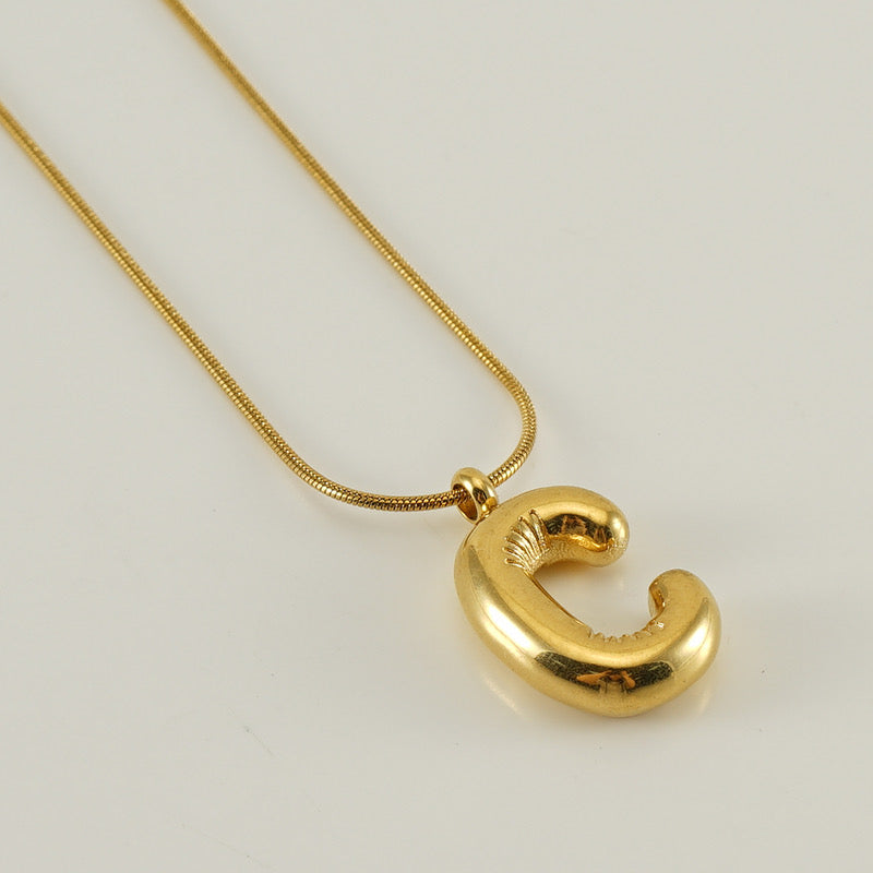 Collar Inicial Grande Dorado Acero