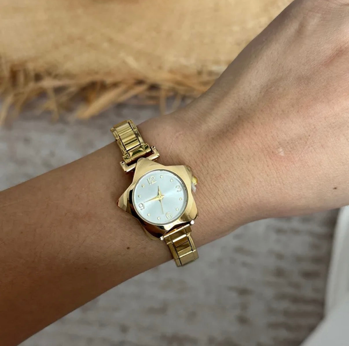 Reloj italiano dorado estrella