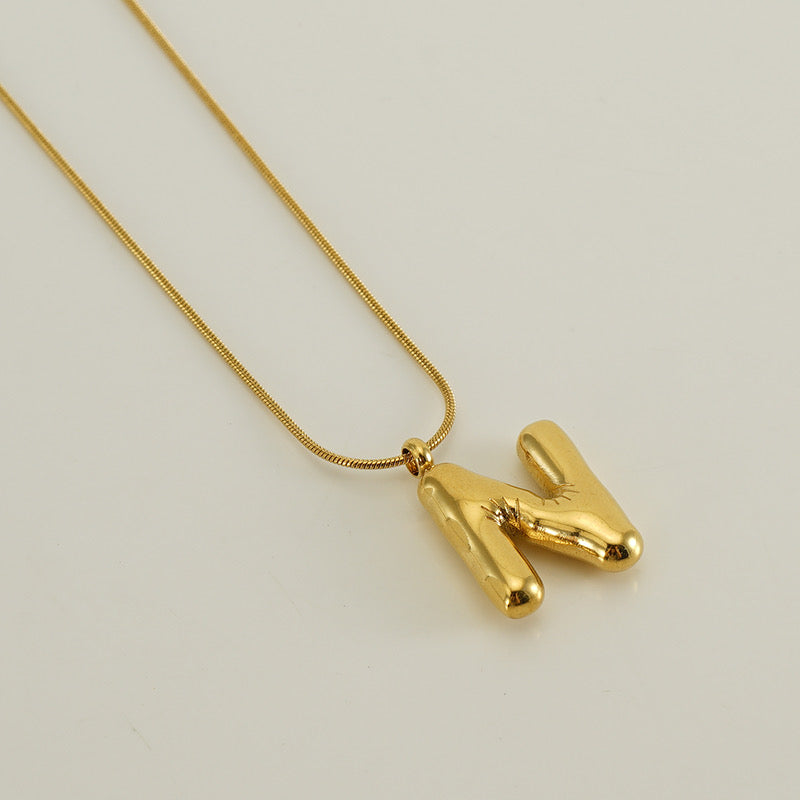 Collar Inicial Grande Dorado Acero