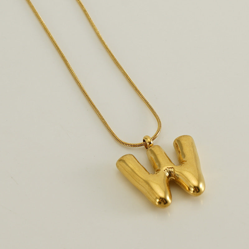 Collar Inicial Grande Dorado Acero